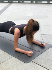 Fit Woman Exercising Outside On The Crow Pro Ultimate Workout Mat by Asana Singapore